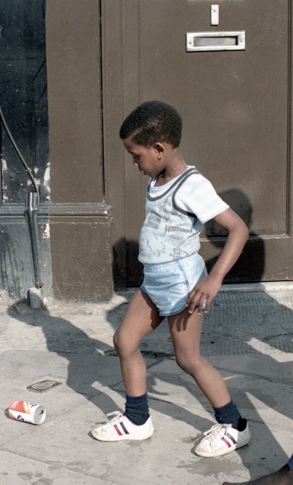 Boy kicking can 1984