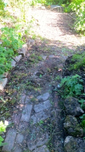 Brick path joining gravel