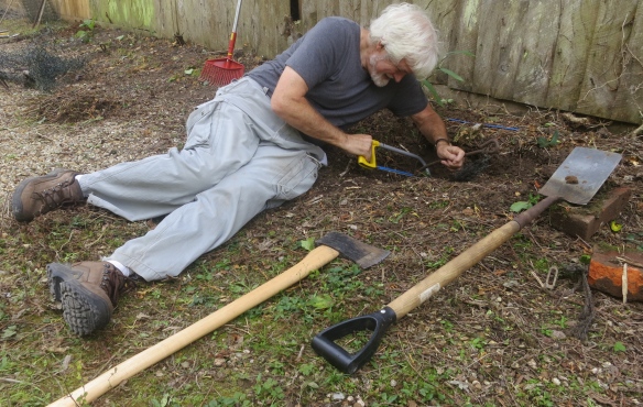 Derrick sawing iron stake