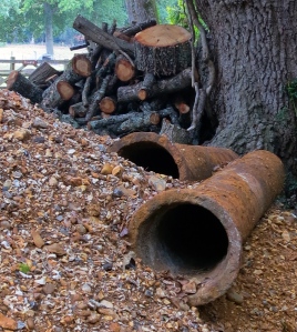 Gravel, pipes, and logs