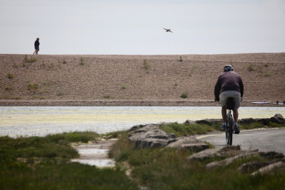 Cyclist, figures on Hurst Spit