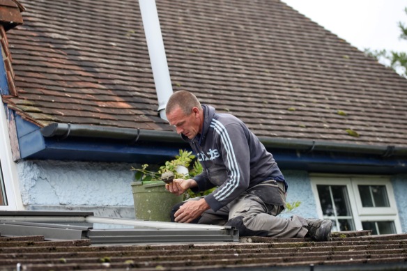 Sid mending roof 1