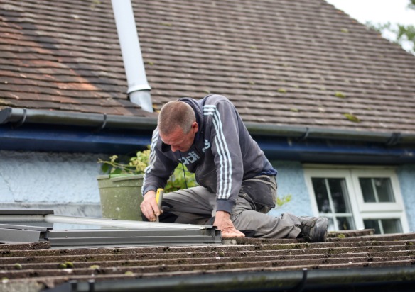 Sid mending roof 2