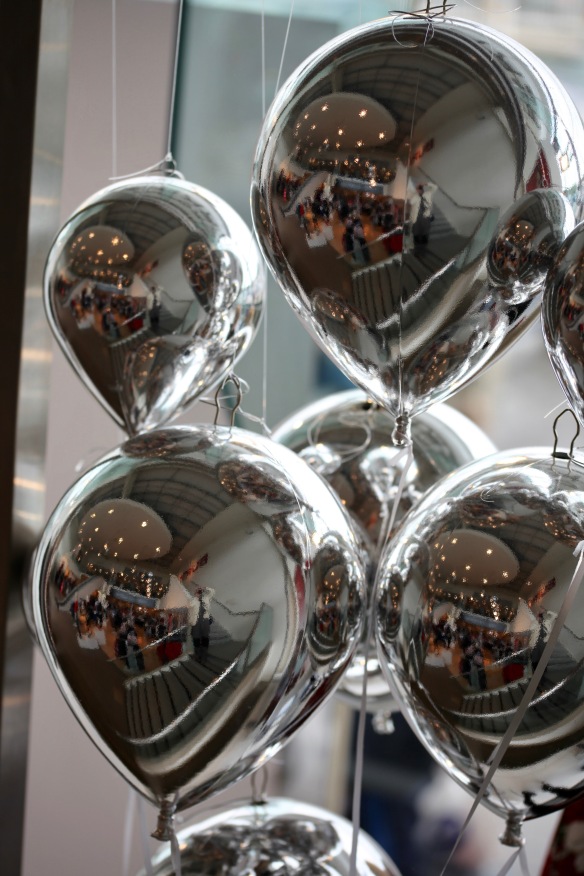 Reflections in silver balloons