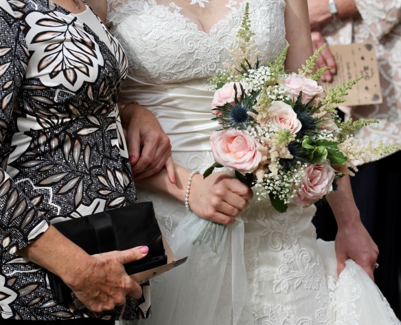 Hands and bouquet