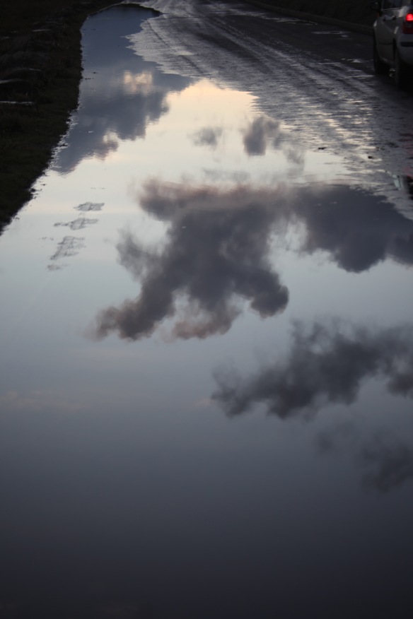 Clouds reflected in pool