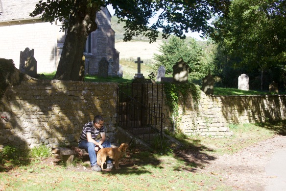 Man and dog outside church