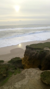 Sun on sand cliff edge