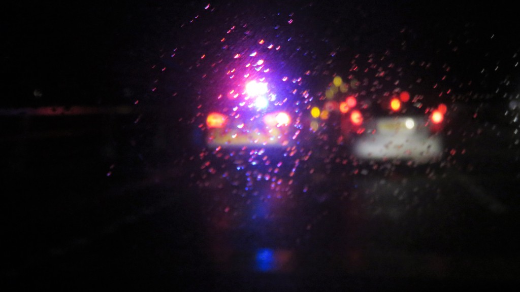 Car lights through wet windscreen