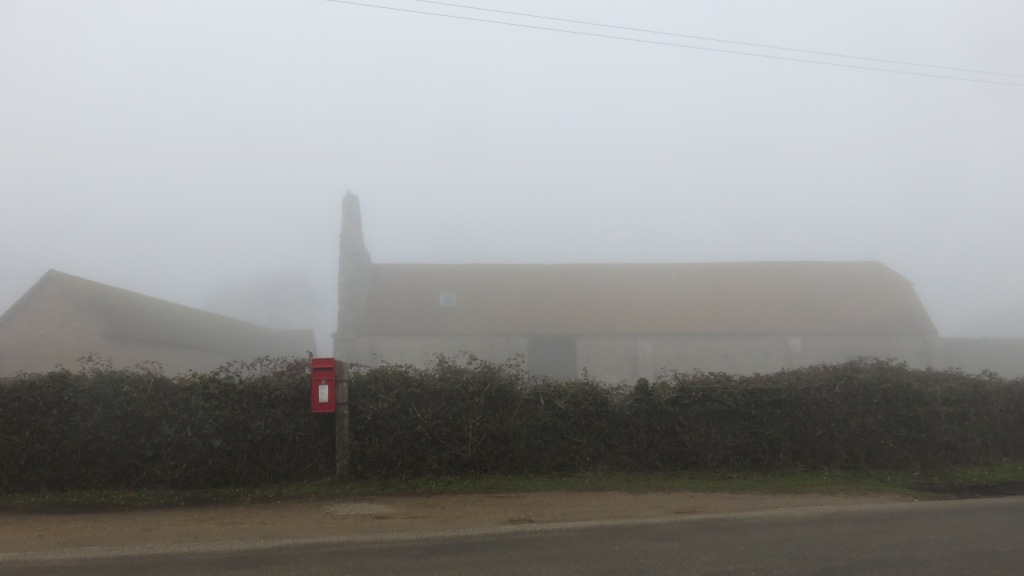 St. Leonard's Grange with post box in fog