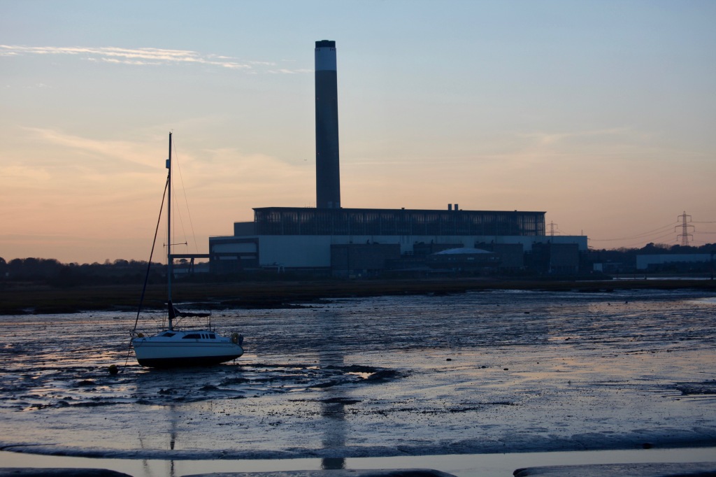 Yacht at low tide, Fawley Power Station