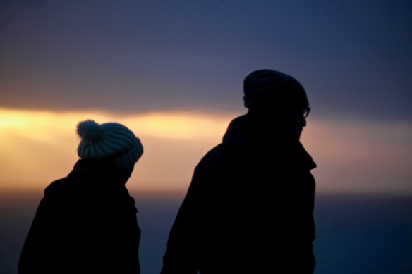 Silhouetted couple at sunset