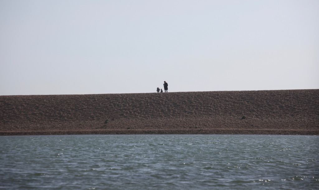 Woman and children on Hurst spit