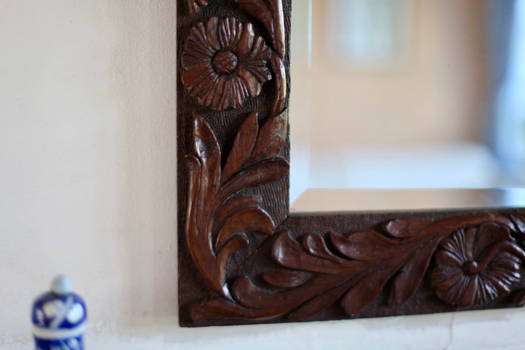 Carving on mirror 1