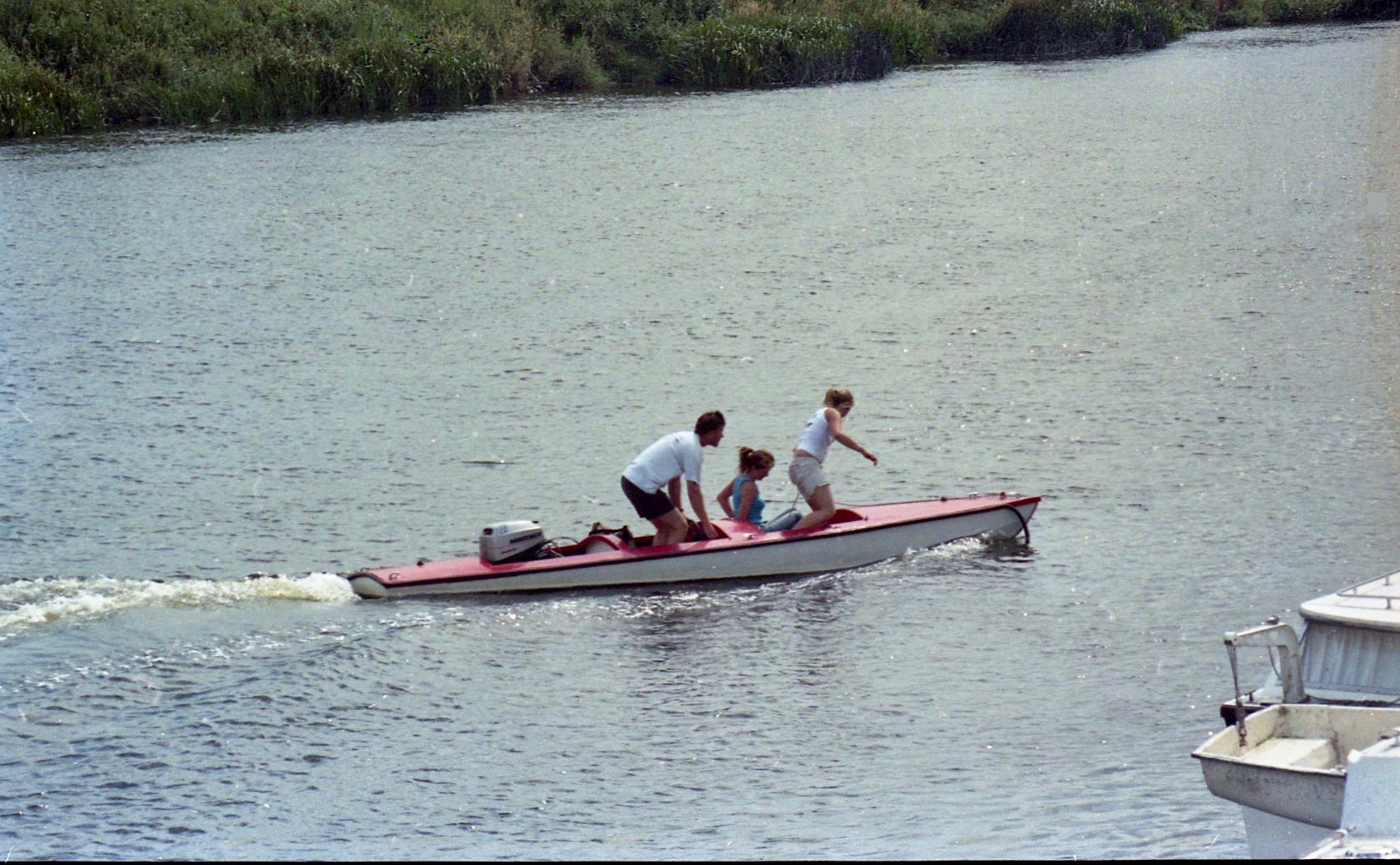 James, Louisa and Gemma in motor boat
